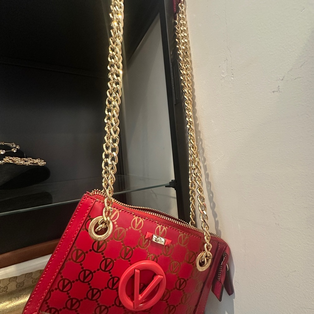 Valentino Luxury Handbag with Gold Accents - Picture 6 of 8